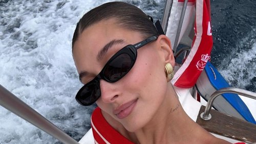 Hailey Bieber emerges from the sea in a tiny red string bikini – wow!