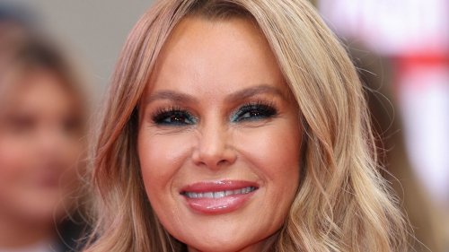 Amanda Holden is a bronzed goddess in daring cut-out mini dress
