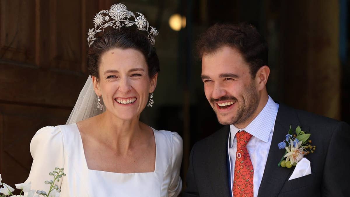 Austrian Countess steals the show in towering £800k 'sunburst' tiara at castle wedding
