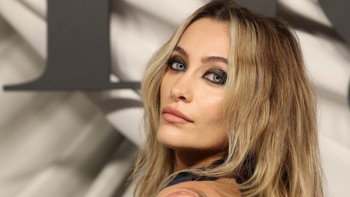 Paris Jackson exposes her eclectic tattoos in daring backless dress