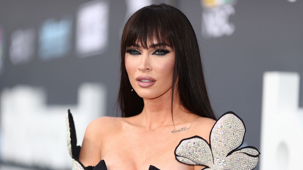 Megan Fox rocks sheer bodysuit and knee-high boots in unexpected hair transformation
