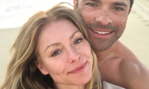 Kelly Ripa looks fabulous in palm tree print swimsuit as she continues her summer vacation