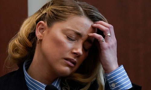 Amber Heard just rocked a special gold ring amid Johnny Depp trial - photos