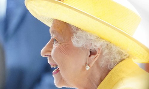 The Queen opens the Elizabeth line in the most vibrant outfit she's ever worn