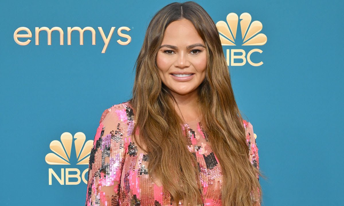 Chrissy Teigen shares adorable photos of her newborn baby while making a surprise Grammys announcement