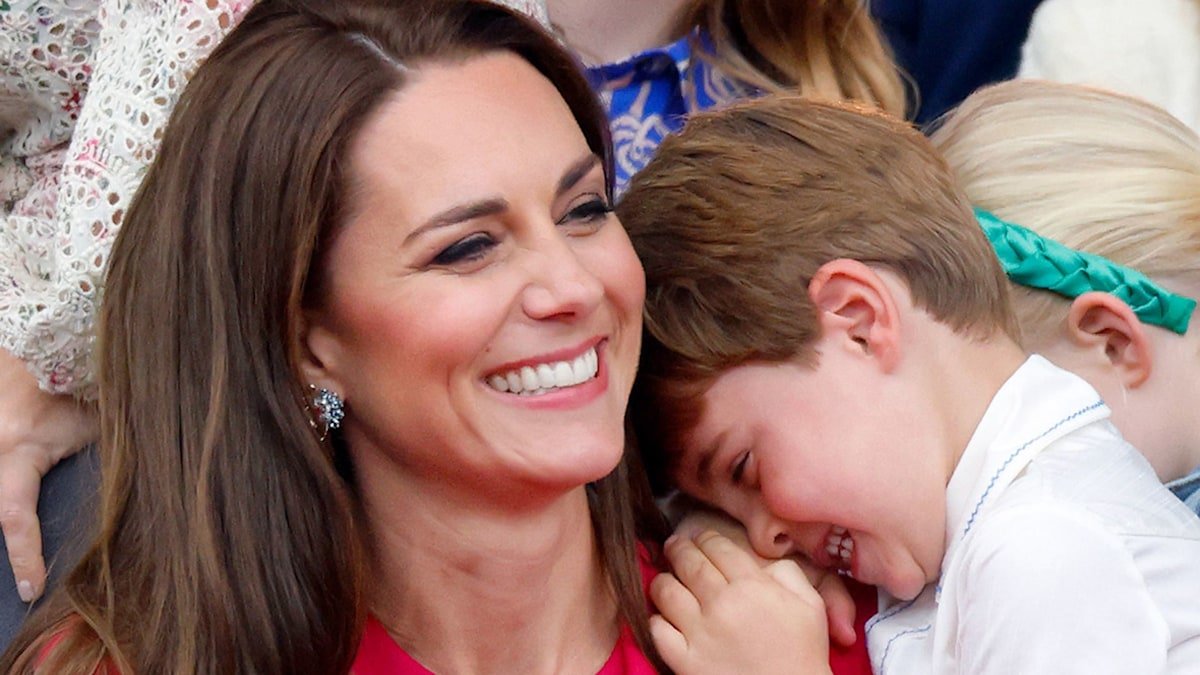 Princess Kate beams as she cradles Prince Louis in new Mother's Day portrait