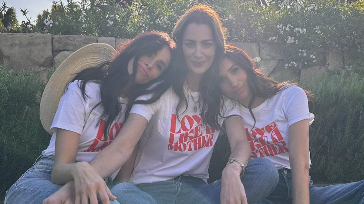 'Inspirational' Meghan Markle cuddles up to closest pals in new intimate photos