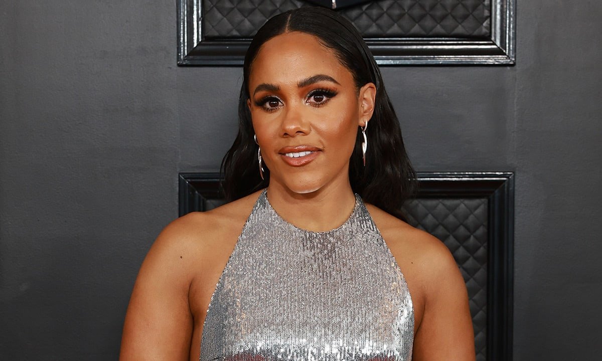Alex Scott makes surprise appearance at the Grammys in figure-hugging daring dress