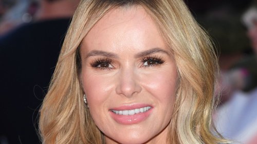 Amanda Holden wows in fitted leopard mini dress and sky-high platforms