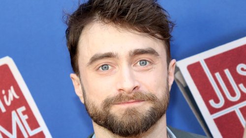 Daniel Radcliffe's statuesque famous girlfriend towers over him in rare red carpet appearance
