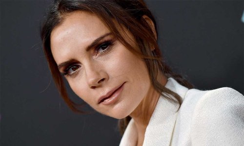 Victoria Beckham dazzles in bold bodycon dress - and check out her boots