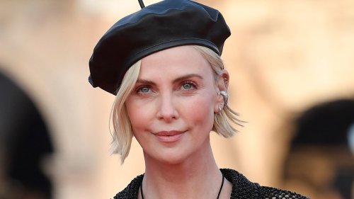 Charlize Theron stuns in swimsuit under see-through mesh dress teasing