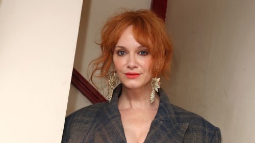 Christina Hendricks steps out in a semi-sheer figure-hugging gown – and check out her insane heels