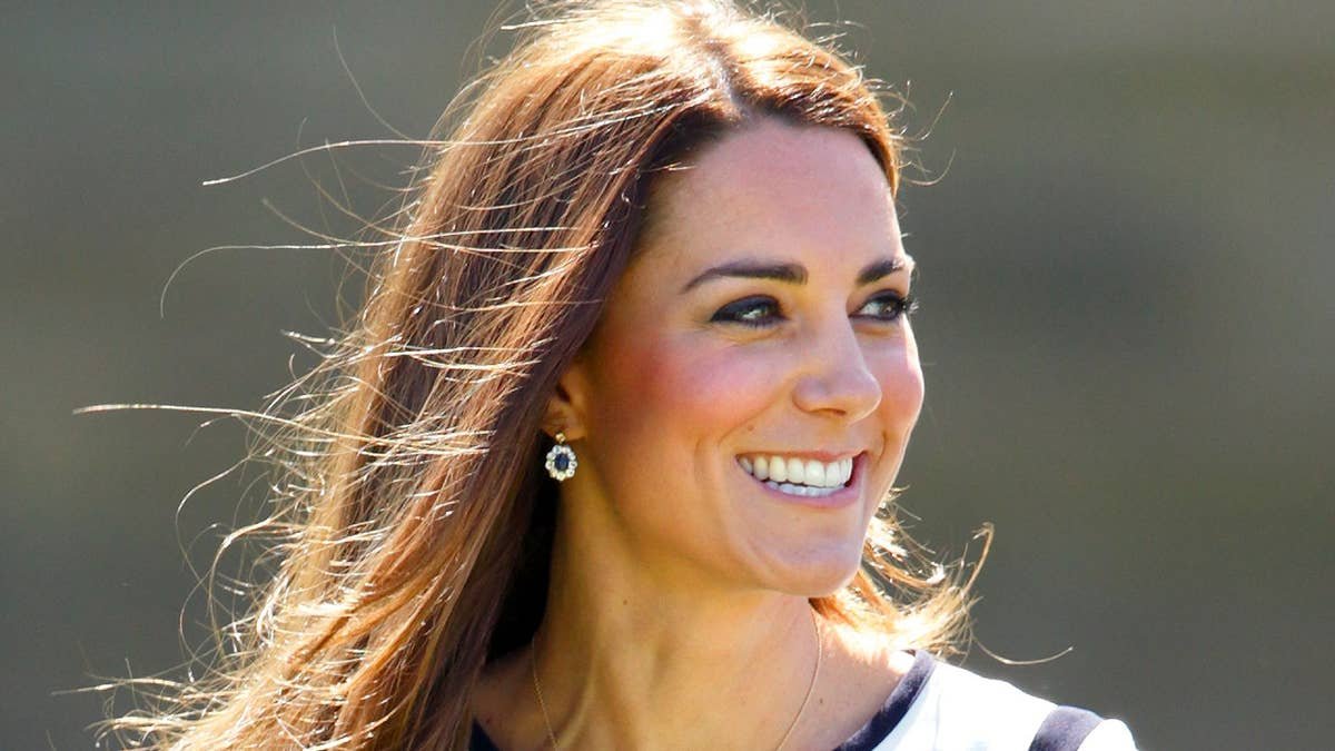 Princess Kate's mini coat-dress and autumn boots couldn't be more on-trend