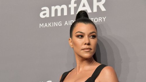 Kourtney Kardashian, 44, unrecognizable in 15 year throwback with big hair and swimsuit
