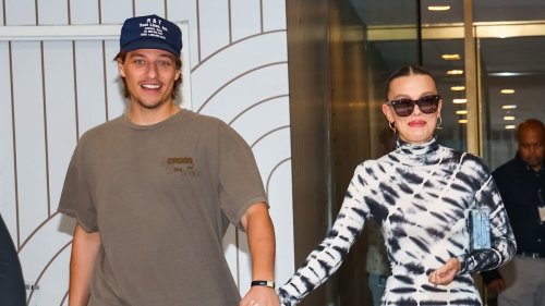 Millie Bobby Brown stuns in a tie-dye maxi for day out with fiancé Jake Bongiovi