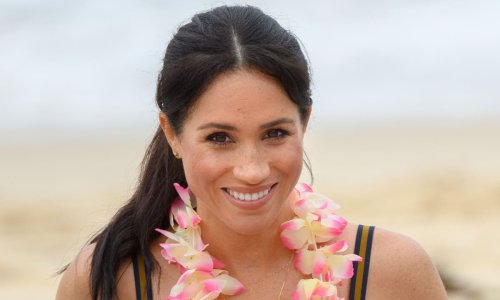 Meghan Markle emerges from outdoor swim in candid photo