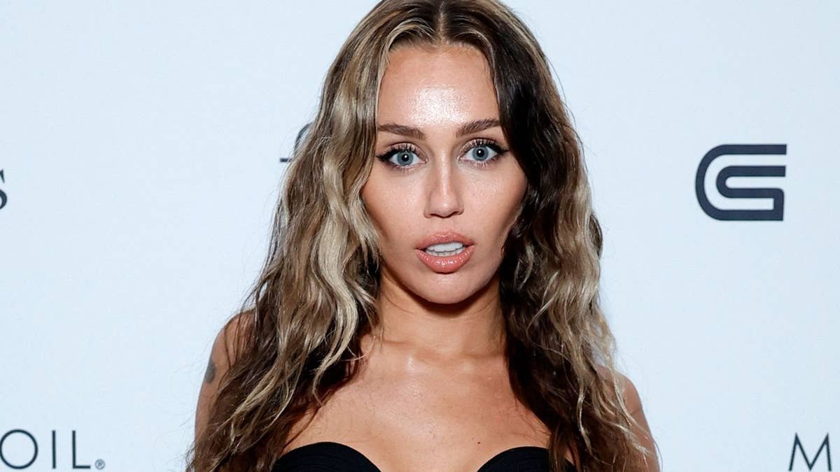 Miley Cyrus is a heatwave goddess in leather and lace ensemble of dreams