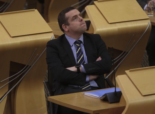 Holyrood call for Boris Johnson to quit puts Tory MSPs on the spot