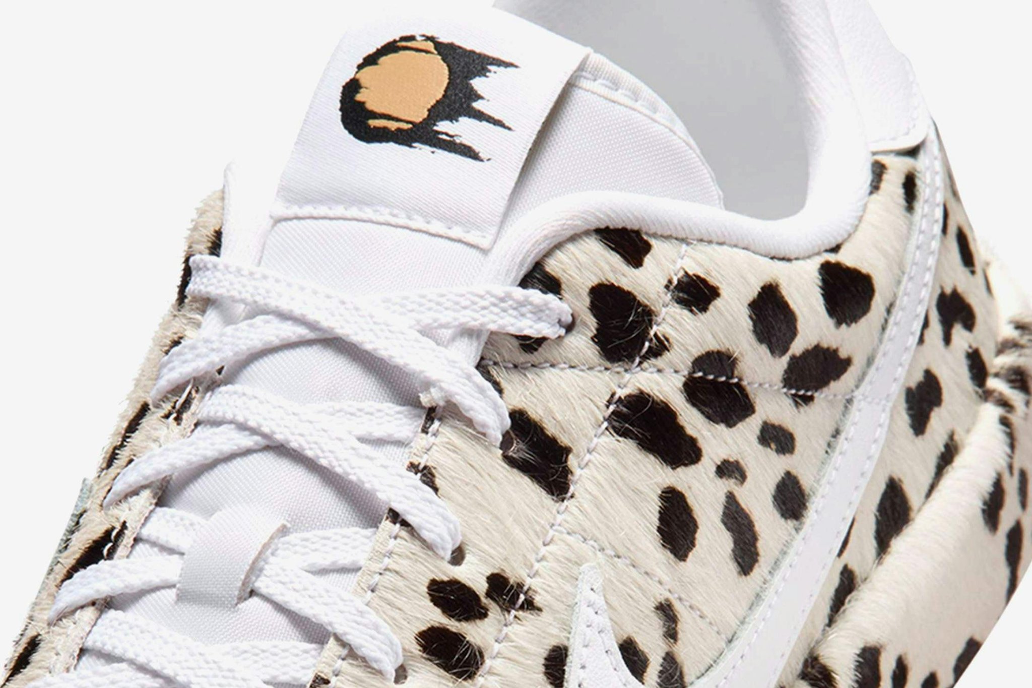 Nike’s Spotted Tennis Sneakers Literally Have That Dawg in ‘Em