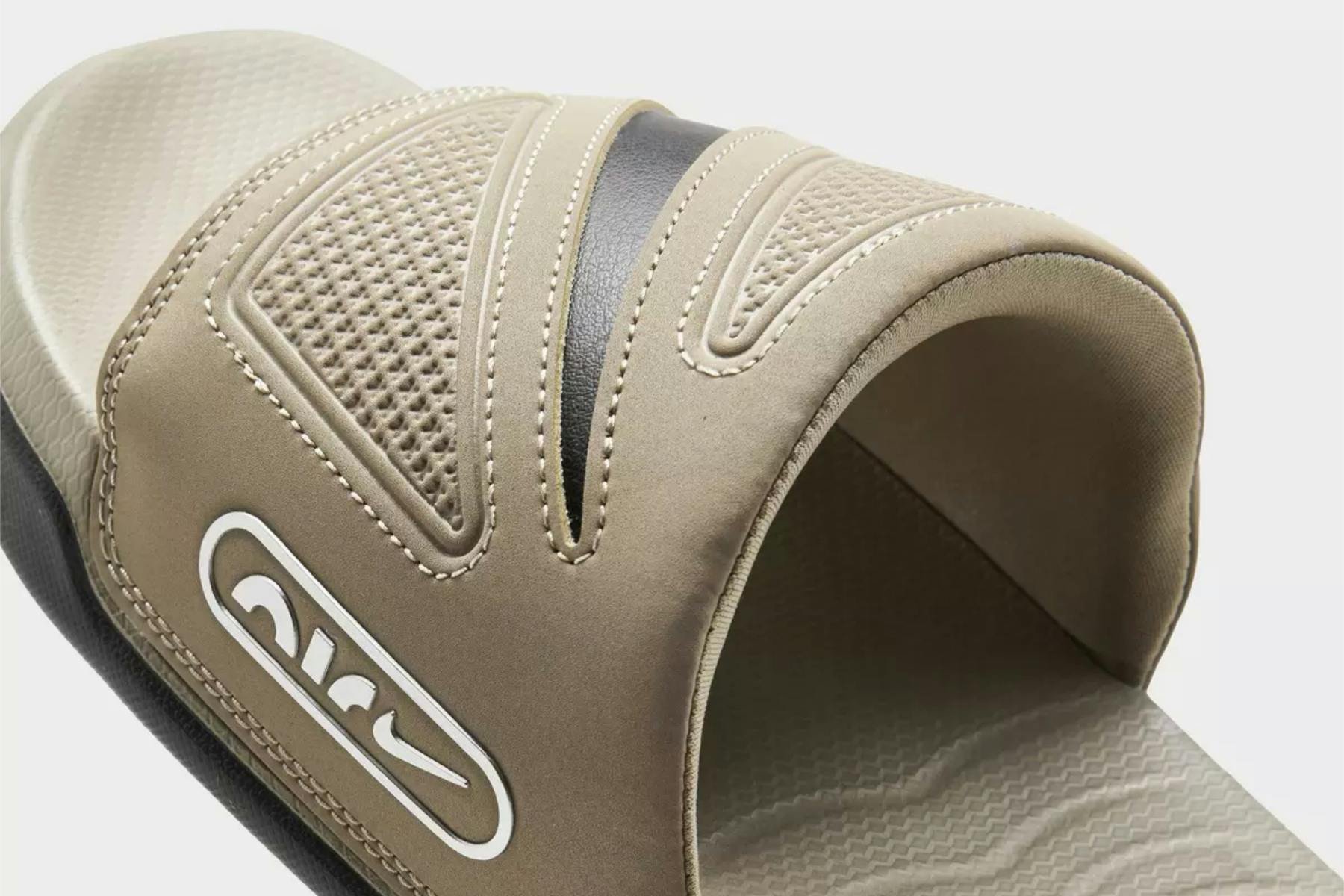 Nike’s Techy-Luxe Slippers Are Basically Off-Duty Air Maxes