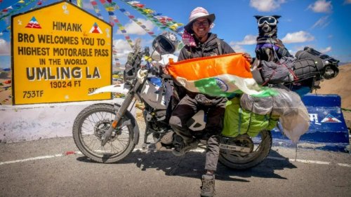 Man travels to world's highest motorable road in Ladakh with pet dog on customised bike. Watch