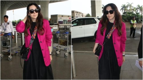 Karisma Kapoor's airport look in black midi, hot pink blazer, no makeup is for those who love fun and comfy travel fits