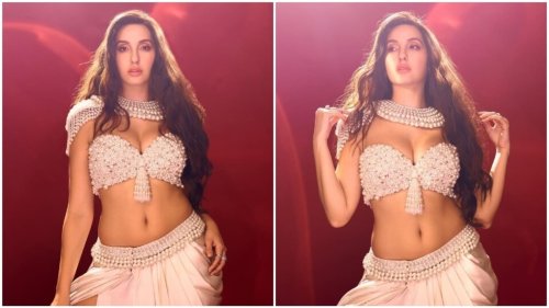 Nora Fatehi sets the internet on fire in a pearl deep-neck bralette and thigh-slit skirt for latest photos. See here