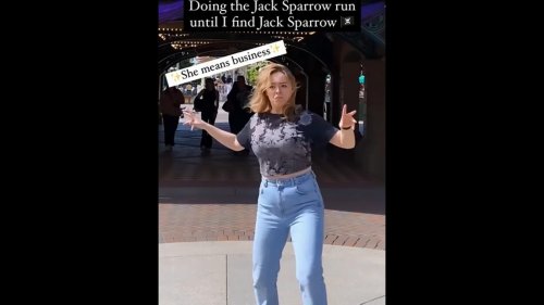 Woman runs like Captain Jack Sparrow at Disneyland until she finds man dressed like him. Watch viral video