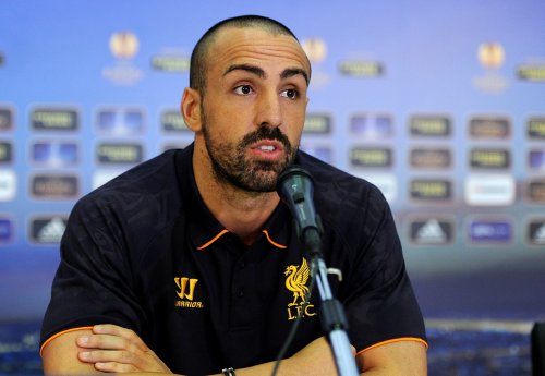 Jose Enrique celebrates news of Firmino's availability for Liverpool v Man United