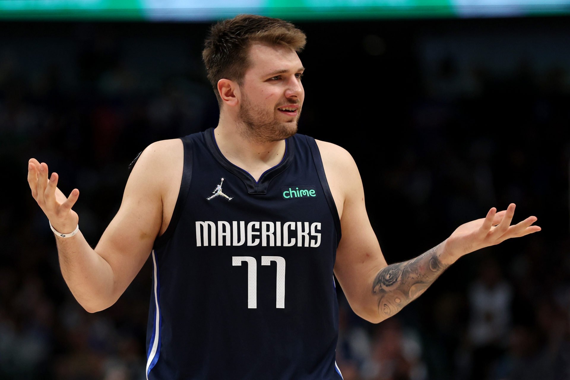 Fans react to wild new photo of Luka Doncic with long shaggy hair and
