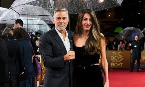 George y Amal Clooney, amor bajo la lluvia y sobre la alfombra roja en una noche muy importante para el actor