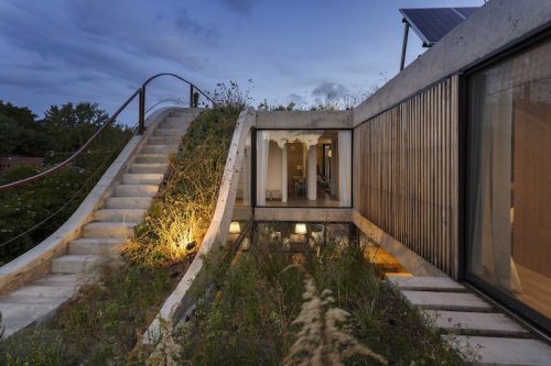 Eco-Friendly House Built Around A Vertical Garden