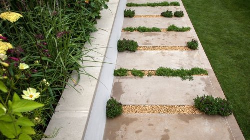 Instead of Pouring a Solid Garden Path, They Set Stepping Stones Into Gravel