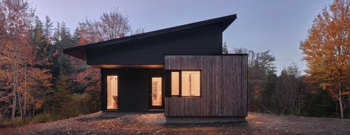 A Charming Lakeside House Made Entirely Of Wood