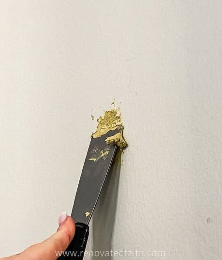 Need to fix a nail hole? Here's how to repair them with this easy