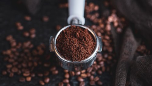 Here's Why You Should Be Putting Coffee Grounds On Your Lawn