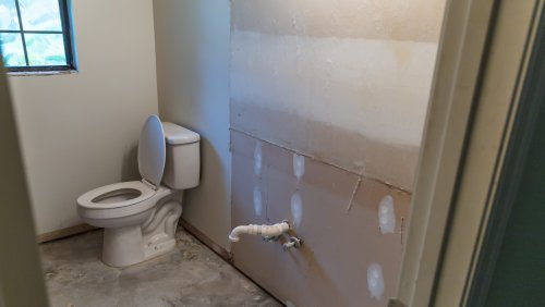 If Your Old Home Has A Stand-Alone Toilet In The Basement, This Is What It Means