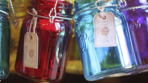 DIY An Eclectic Garden Edge Border From Glass Jars