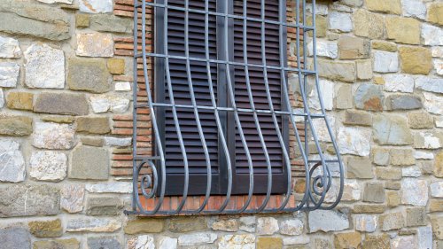 Why Do Some Window Grills Have A Curve At The Bottom?