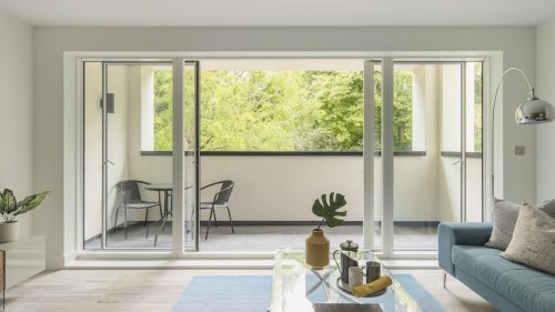The Alternative To Plastic Blinds That Adds Way More Privacy To Sliding Glass Doors