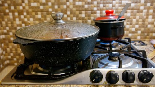 Don't Toss An Old Pot Lid - Reuse It To Create An Adorable Kitchen Decor Piece