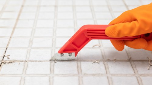 Mistakes You're Making When Regrouting Bathroom Tile (And How To Do It Right)