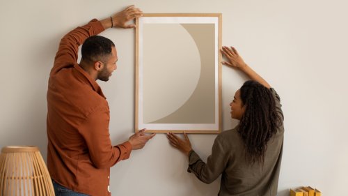Turn Old, Heavy Art Into Easy-To-Hang Pieces With One Simple Step
