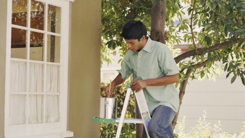 Here's What Happens To Your Home's Exterior If You Paint On A Hot Day