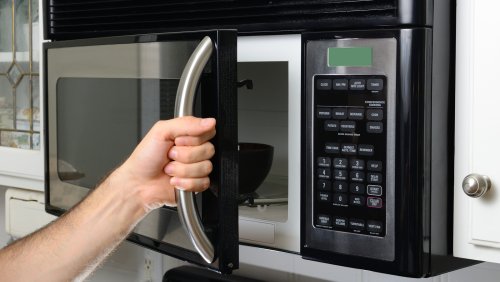 Don't Make This Harmful Mistake When Cleaning Your Microwave
