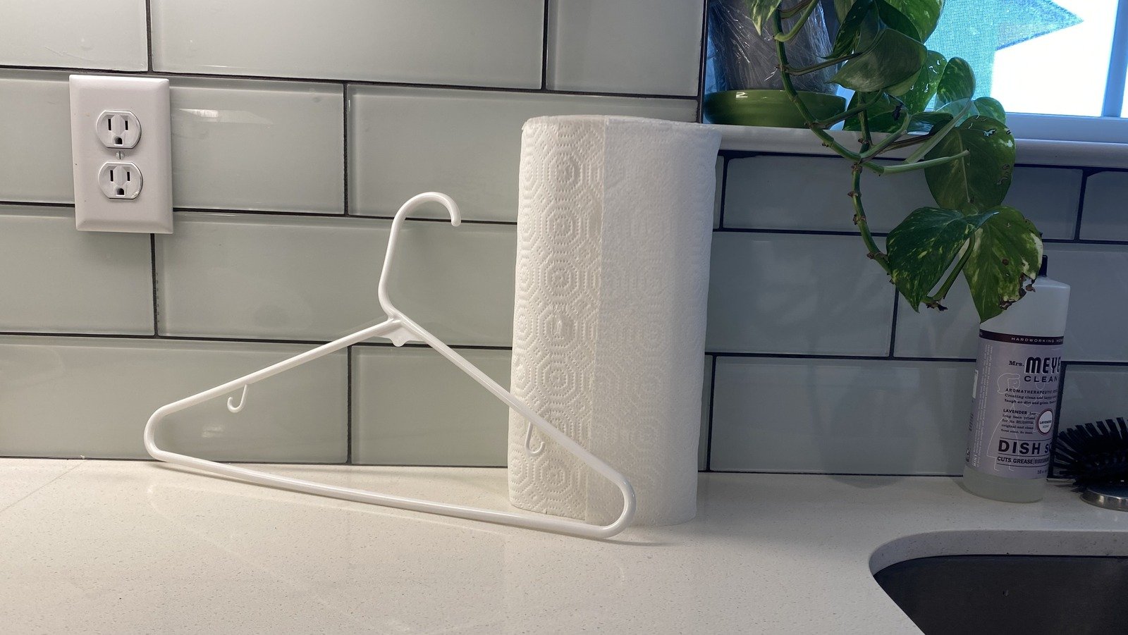 We Tried The Coat Hanger As A Paper Towel Holder Hack And We Can Roll With These Two Perks