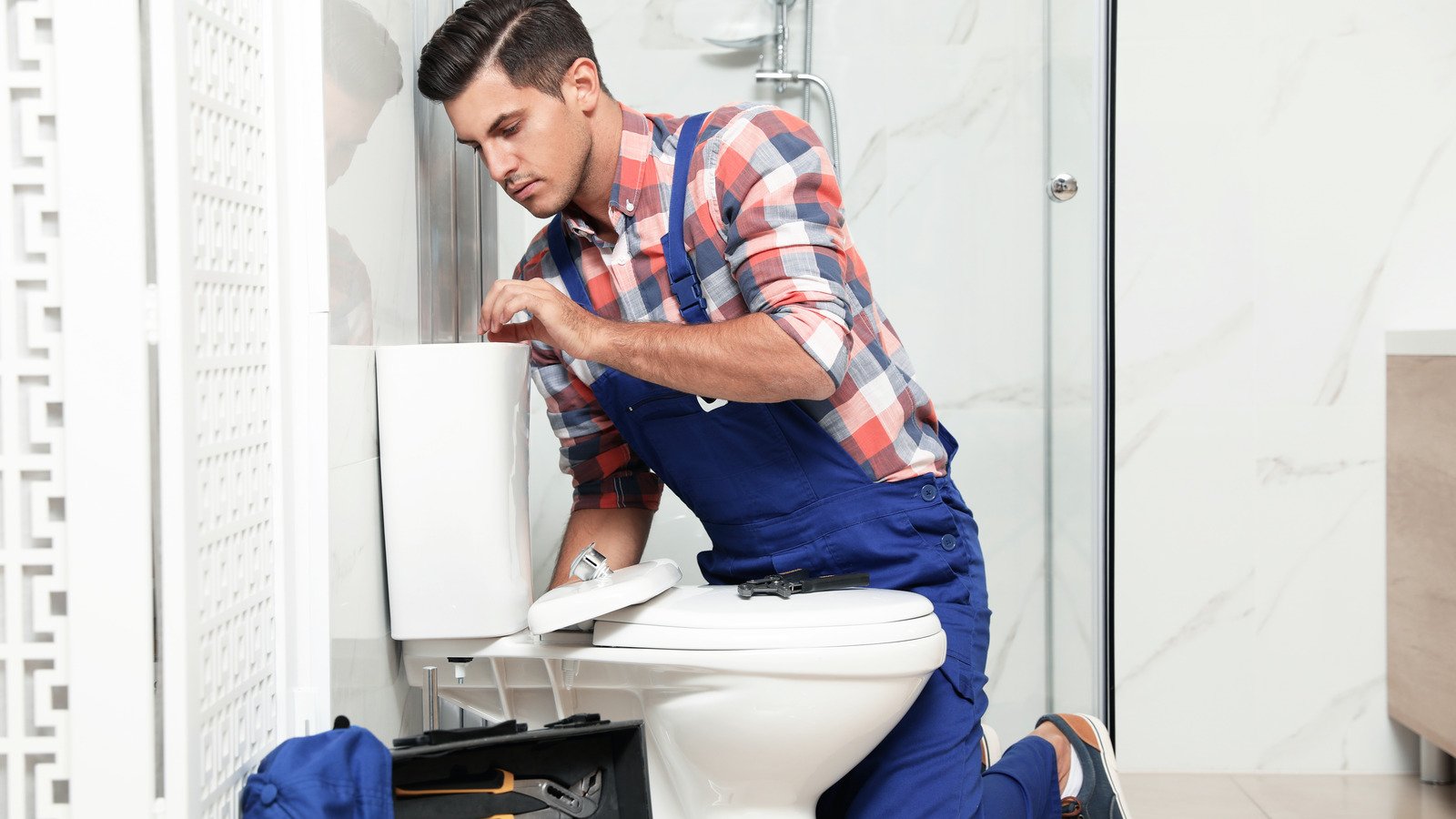 The Biggest Scams To Watch For With Plumbers - House Digest