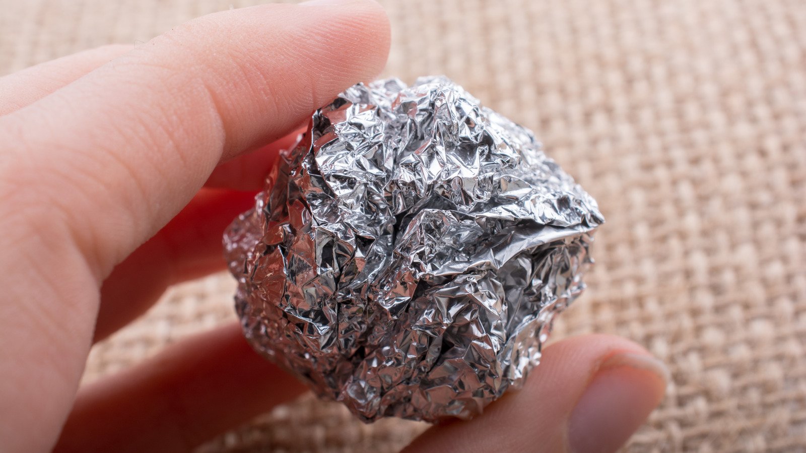 What Really Happens If You Put Aluminum Foil Balls In The Dryer - House Digest