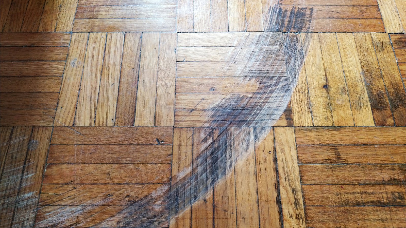 Inexpensive Ways To Fix The Huge Scratch In Your Wood Floor - House Digest